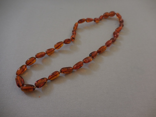 Collier bébé Ambre olivettes cognac